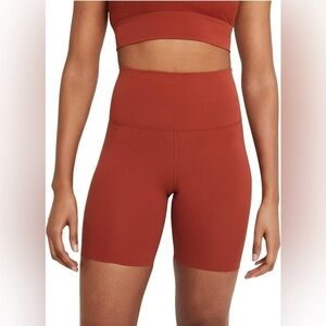 Nike Yoga Lux 7" High Waist Compression Bike Shorts in Rust Orange